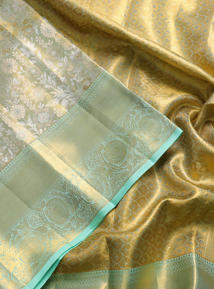 Pure kanchipuram tissue silk saree gold and pista green shade with allover zari woven floral brocade weaves and rich zari woven border