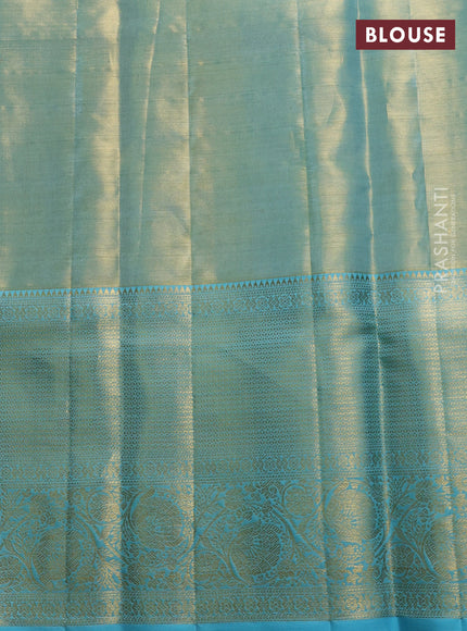 Pure kanchipuram tissue silk saree dual shade of light blue with allover zari woven brocade weaves and rich zari woven border
