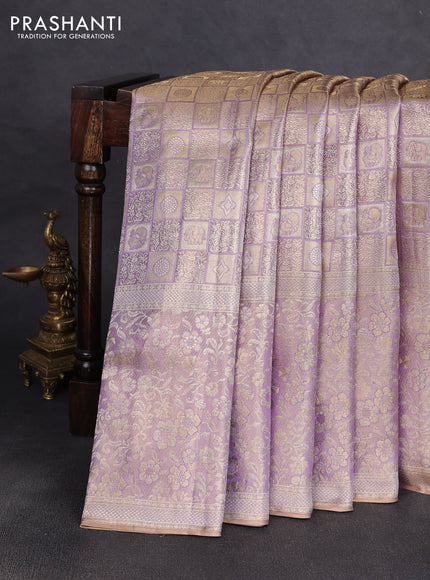 Pure kanchipuram tissue silk saree dual shade of lavender with alllover zari woven floral brocade weaves and zari woven border
