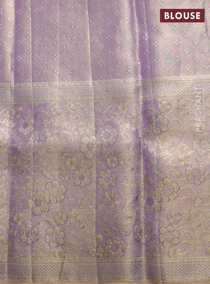Pure kanchipuram tissue silk saree dual shade of lavender with alllover zari woven floral brocade weaves and zari woven border