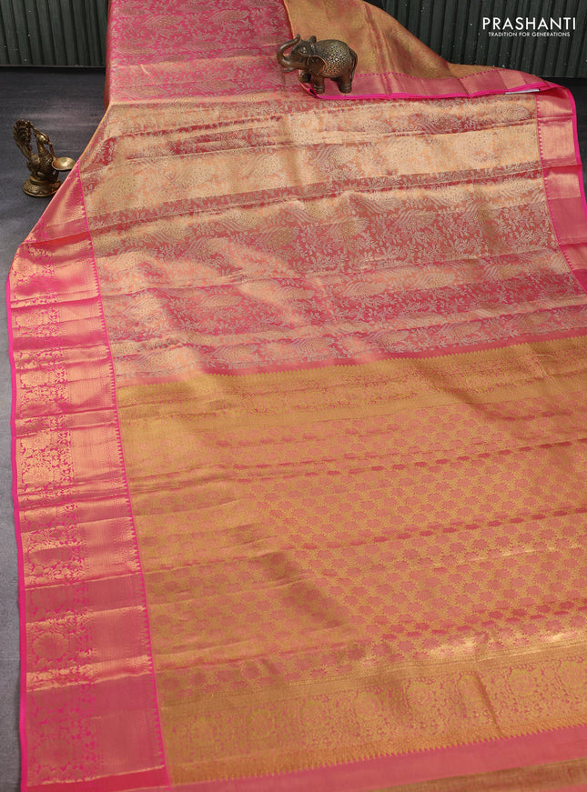 Pure kanchipuram tissue silk saree golden pink and pink with allover zari woven brocade weaves and rich zari woven border