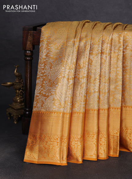 Pure kanchipuram tissue silk saree dark mustard with allover zari woven brocade weaves and rich zari woven border