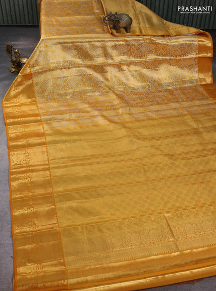 Pure kanchipuram tissue silk saree dark mustard with allover zari woven brocade weaves and rich zari woven border