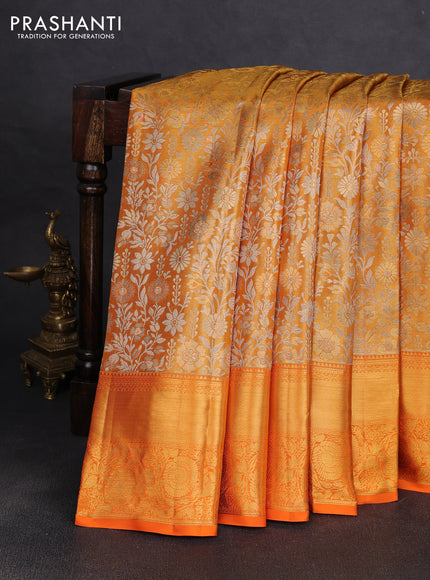 Pure kanchipuram tissue silk saree orange with allover zari woven brocade weaves and rich zari woven border