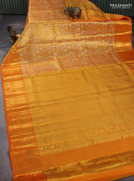 Pure kanchipuram tissue silk saree orange with allover zari woven brocade weaves and rich zari woven border