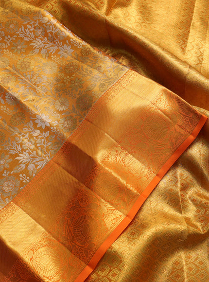 Pure kanchipuram tissue silk saree orange with allover zari woven brocade weaves and rich zari woven border