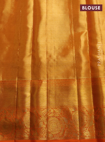 Pure kanchipuram tissue silk saree orange with allover zari woven brocade weaves and rich zari woven border