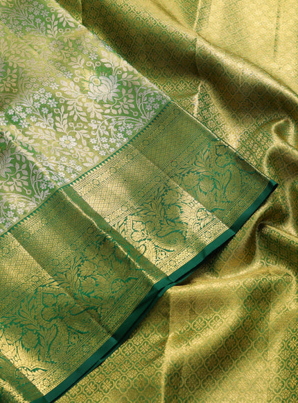 Pure kanchipuram tissue silk saree green with allover zari woven brocade weaves and rich zari woven border