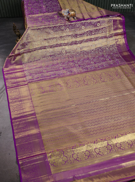 Pure kanchipuram tissue silk saree dual shade of purple with allover zari woven brocade weaves and rich zari woven border