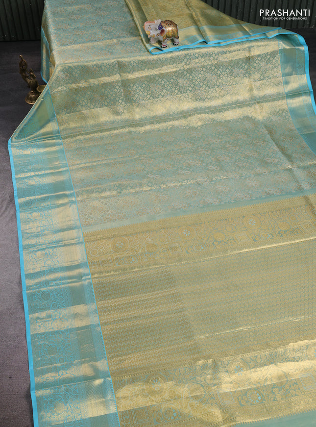 Pure kanchipuram tissue silk saree golden light blue with allover zari woven brocade weaves and rich zari woven border