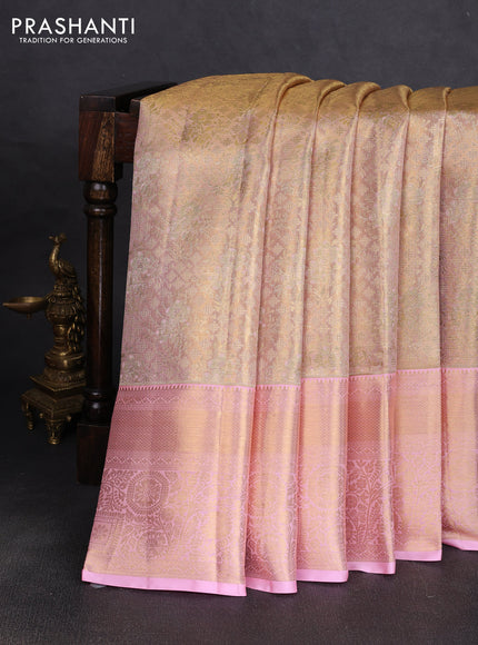 Pure kanchipuram tissue silk saree golden baby pink and light pink with allover zari woven brocade weaves and rich zari woven border