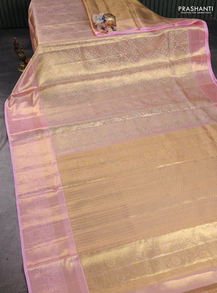 Pure kanchipuram tissue silk saree golden baby pink and light pink with allover zari woven brocade weaves and rich zari woven border