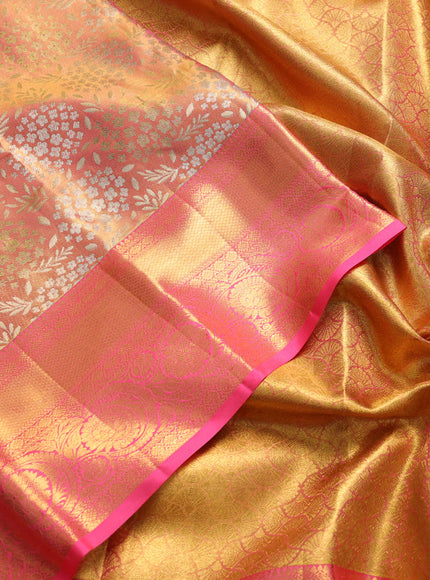 Pure kanchipuram tissue silk saree dual shade of golden peach and peach pink with allover zari woven floral brocade weaves and rich zari woven border