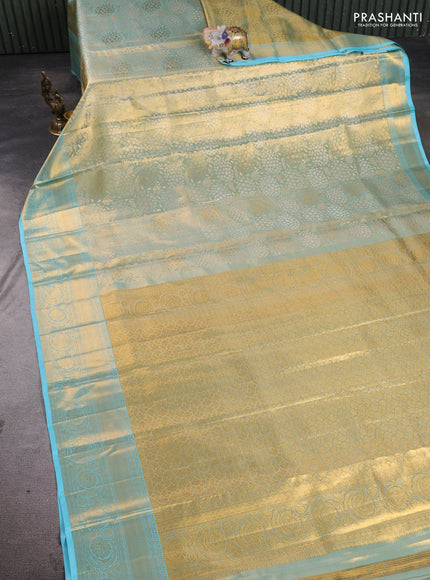 Pure kanchipuram tissue silk saree golden light blue and light blue with allover zari woven floral brocade weaves and rich zari woven border