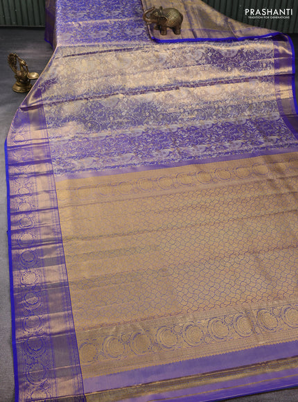 Pure kanchipuram tissue silk saree dual shade of golden blue and blue with allover zari woven brocade weaves and rich zari woven border