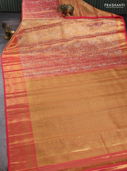 Pure kanchipuram tissue silk saree golden orange with allover zari woven brocade weaves and rich zari woven border