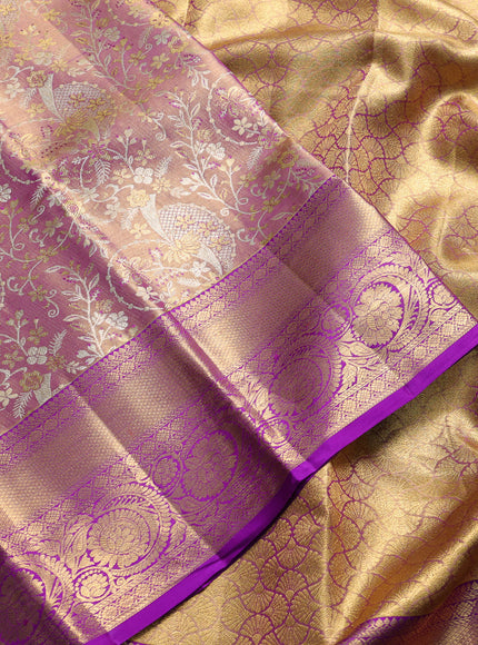 Pure kanchipuram tissue silk saree dual shade of mild purple and purple with allover zari woven brocade weaves and rich zari woven border