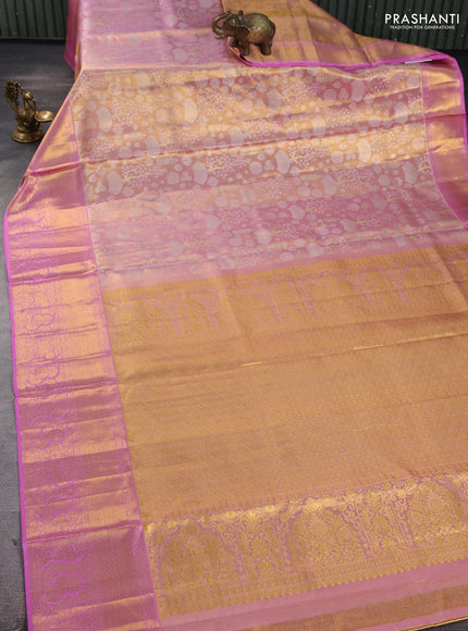 Pure kanchipuram tissue silk saree dual shade of light pink with allover zari woven brocade weaves and rich zari woven border