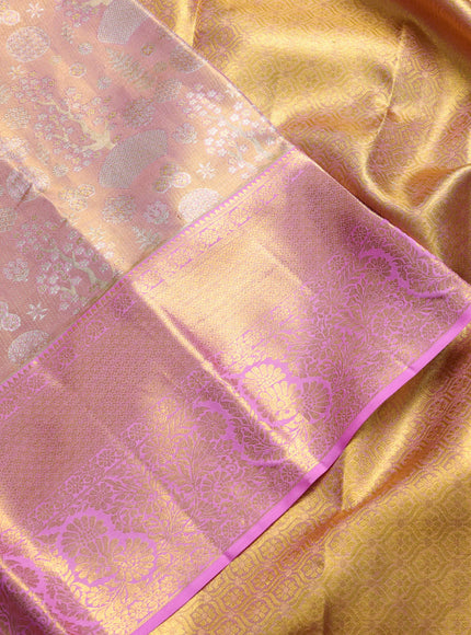 Pure kanchipuram tissue silk saree dual shade of light pink with allover zari woven brocade weaves and rich zari woven border
