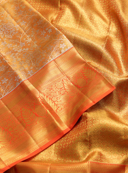 Pure kanchipuram tissue silk saree orange with allover zari woven floral brocade weaves and rich zari woven border