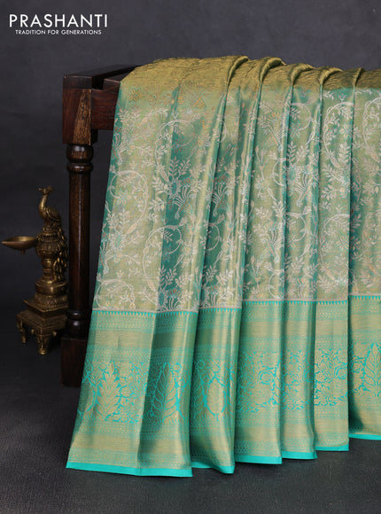 Pure kanchipuram tissue silk saree teal green with allover zari woven floral brocade weaves and rich zari woven border