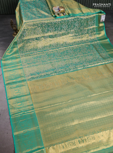 Pure kanchipuram tissue silk saree teal green with allover zari woven floral brocade weaves and rich zari woven border
