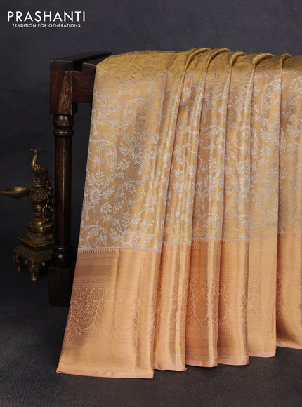 Pure kanchipuram tissue silk saree gold and sandal with allover zari woven floral brocade weaves and rich zari woven border