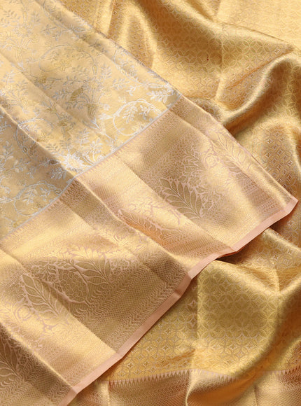 Pure kanchipuram tissue silk saree gold and sandal with allover zari woven floral brocade weaves and rich zari woven border