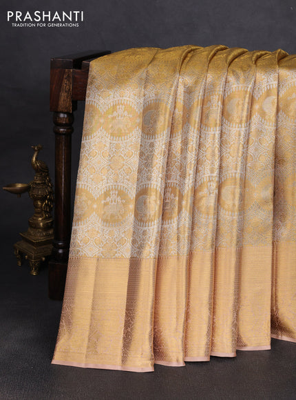 Pure kanchipuram tissue silk saree gold and sandal with allover zari woven brocade weaves and rich zari woven border