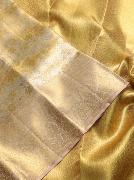 Pure kanchipuram tissue silk saree gold and sandal with allover zari woven brocade weaves and rich zari woven border