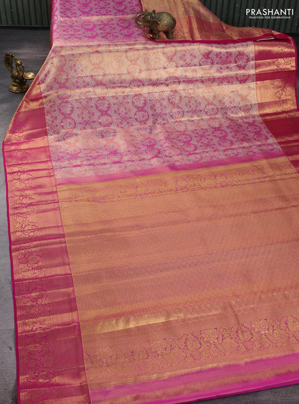 Pure kanchipuram tissue silk saree golden pink and magenta pink with allover zari woven brocade weaves and rich zari woven border