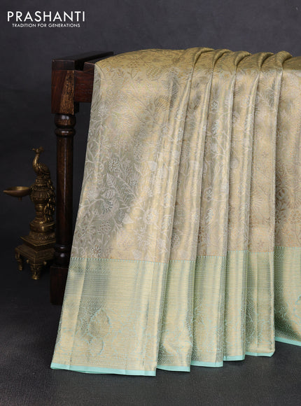 Pure kanchipuram tissue silk saree dual shade of pista green with allover zari woven floral brocade weaves and rich zari woven border