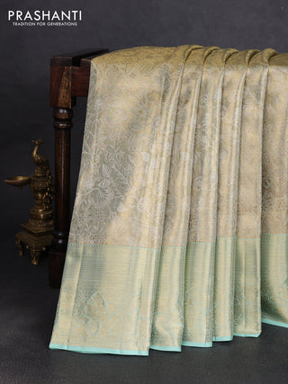 Pure kanchipuram tissue silk saree dual shade of pista green with allover zari woven floral brocade weaves and rich zari woven border