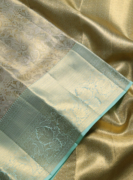 Pure kanchipuram tissue silk saree dual shade of pista green with allover zari woven floral brocade weaves and rich zari woven border