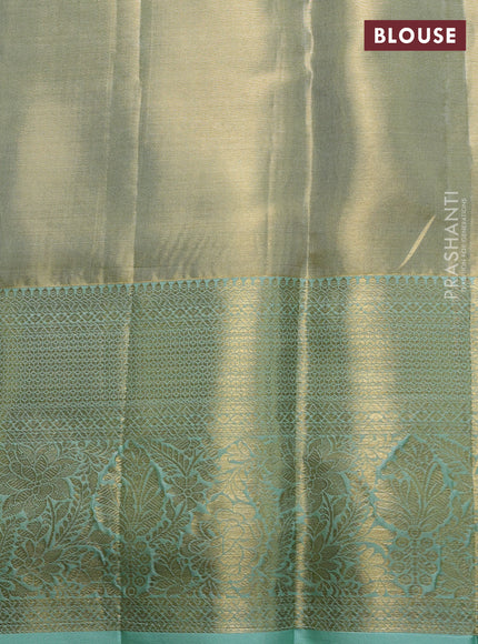 Pure kanchipuram tissue silk saree dual shade of pista green with allover zari woven floral brocade weaves and rich zari woven border