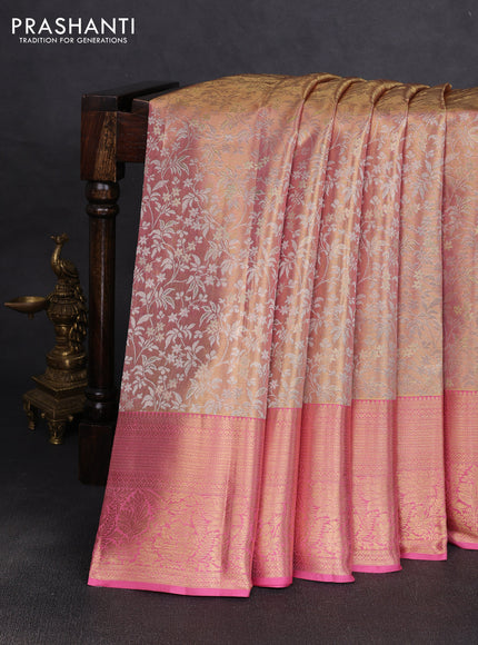 Pure kanchipuram tissue silk saree dual shade of baby pink and light pink with allover zari woven floral brocade weaves and rich zari woven border