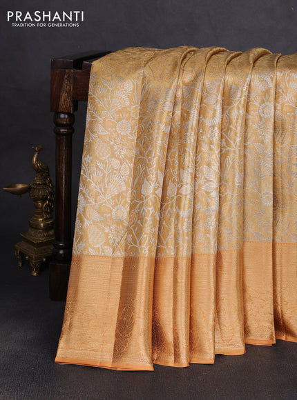Pure kanchipuram tissue silk saree sandal with allover zari woven floral brocade weaves and rich zari woven border