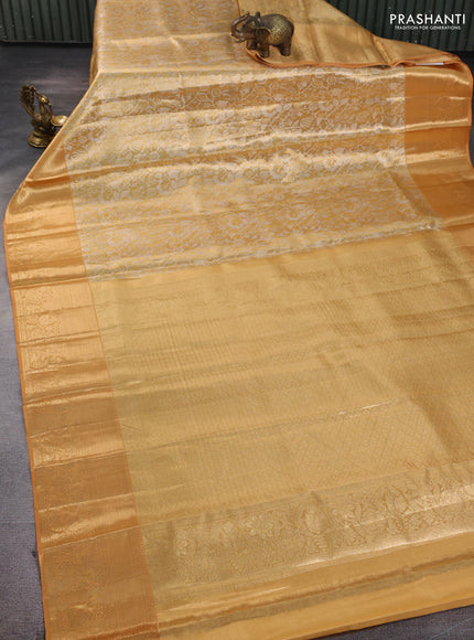 Pure kanchipuram tissue silk saree sandal with allover zari woven floral brocade weaves and rich zari woven border