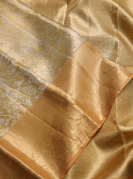 Pure kanchipuram tissue silk saree sandal with allover zari woven floral brocade weaves and rich zari woven border