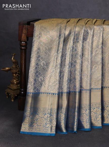 Pure kanchipuram tissue silk saree dual shade of peacock blue with allover zari woven brocade weaves and rich zari woven border