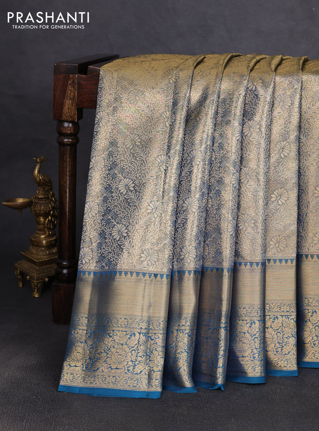 Pure kanchipuram tissue silk saree dual shade of peacock blue with allover zari woven brocade weaves and rich zari woven border