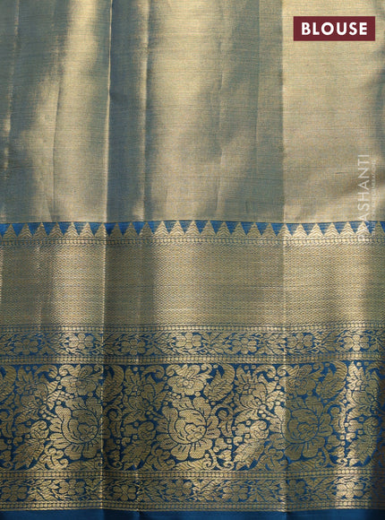 Pure kanchipuram tissue silk saree dual shade of gold and peacock blue with allover zari woven brocade peacock weaves and rich zari woven border