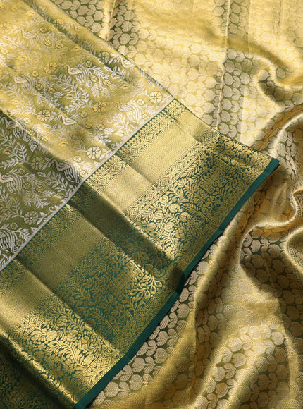 Pure kanchipuram tissue silk saree golden green and green with allover zari woven brocade peacock weaves and rich zari woven border