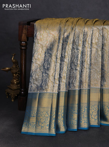 Pure kanchipuram tissue silk saree gold and peacock green with allover zari woven brocade peacock weaves and rich zari woven border