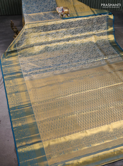 Pure kanchipuram tissue silk saree gold and peacock green with allover zari woven brocade peacock weaves and rich zari woven border