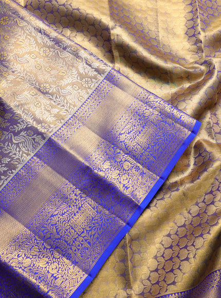 Pure kanchipuram tissue silk saree gold and royal blue with allover zari woven brocade peacock weaves and rich zari woven border