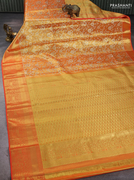 Pure kanchipuram tissue silk saree orange with allover zari woven brocade floral weaves and rich zari woven border