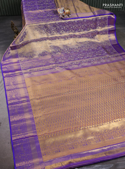 Pure kanchipuram tissue silk saree dual shade of gold and royal blue with allover zari woven brocade floral weaves and rich zari woven border
