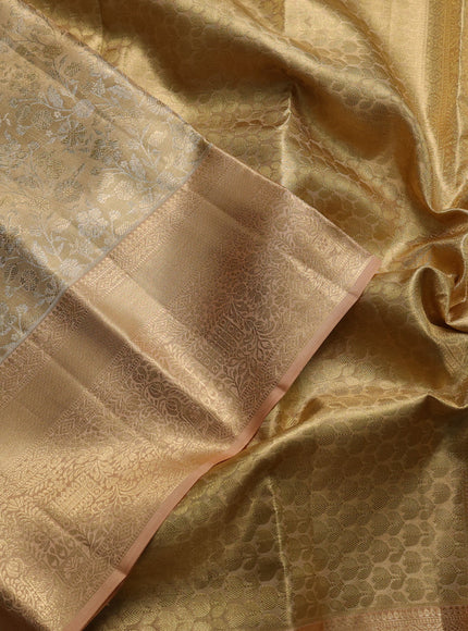 Pure kanchipuram tissue silk saree sandal with allover zari woven brocade weaves and rich zari woven border