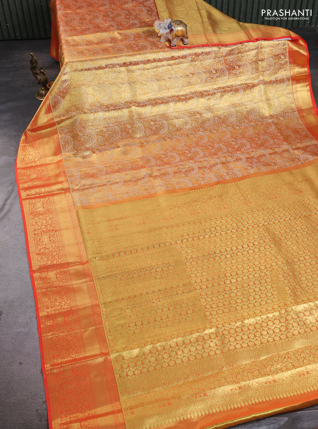 Pure kanchipuram tissue silk saree orange with allover zari woven brocade weaves and rich zari woven border